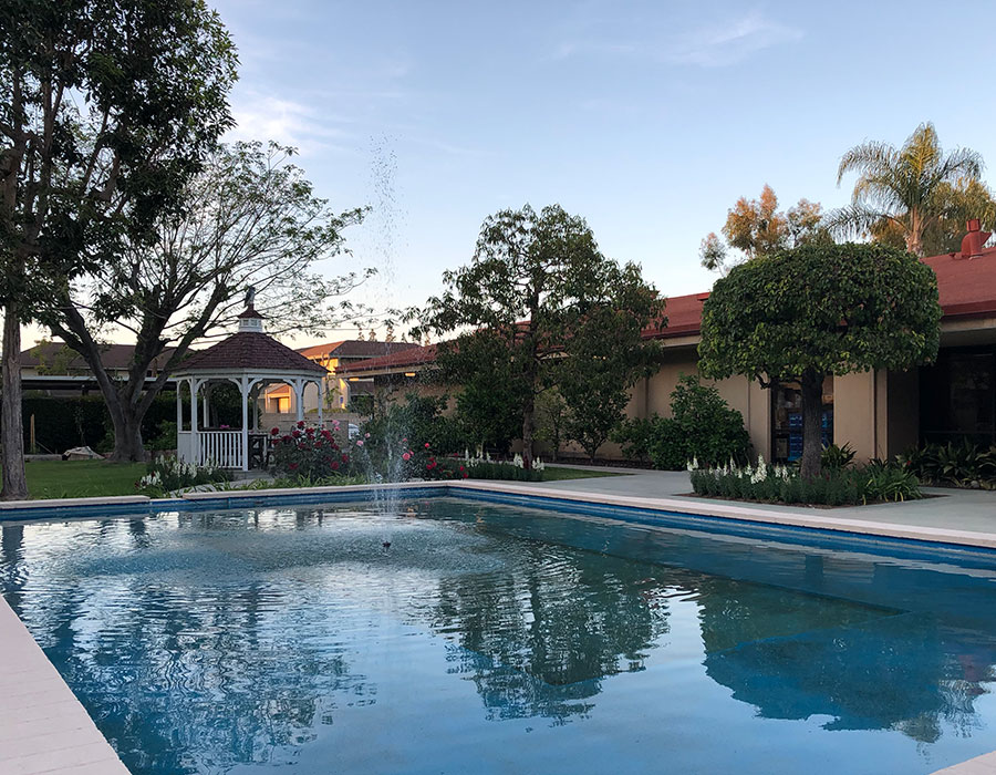 Our Beautiful Fountain at Dusk - Town & Country - Independent & Assisted Living in Santa Ana, CA