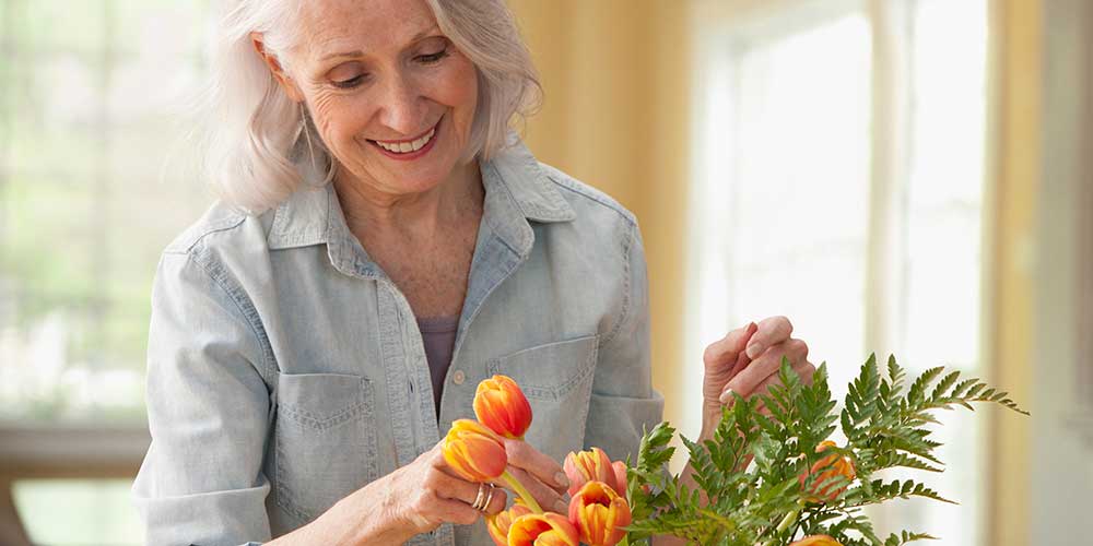 Flower arranging - Retirement Community in Santa Ana CA - Town & Country